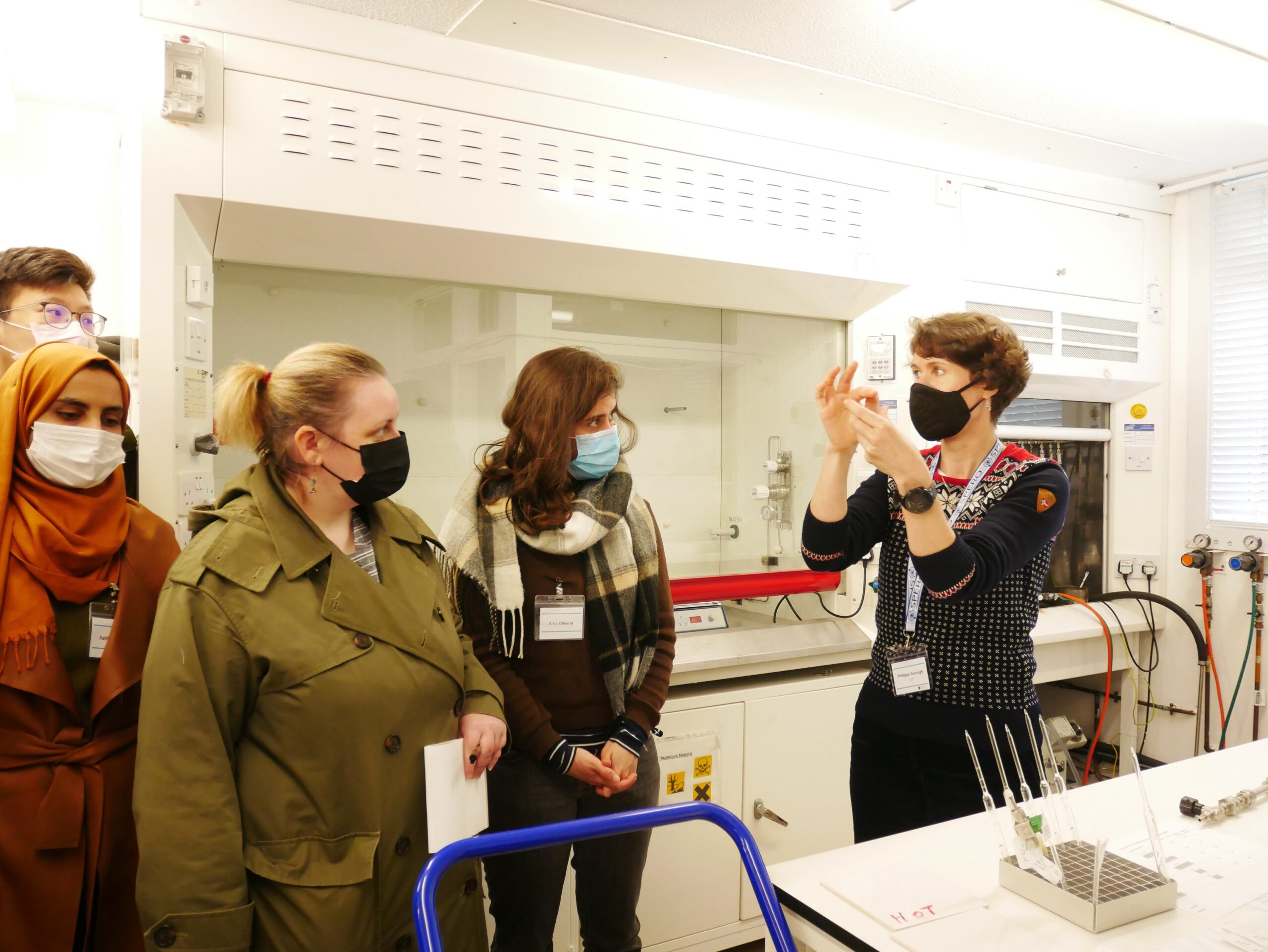 A professor teaching in a lab